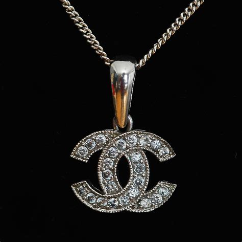 chanel logo jewelry necklace|Chanel long necklace with logo.